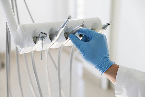 Professional Invisalign Clear Aligners technician working in Bells, TX